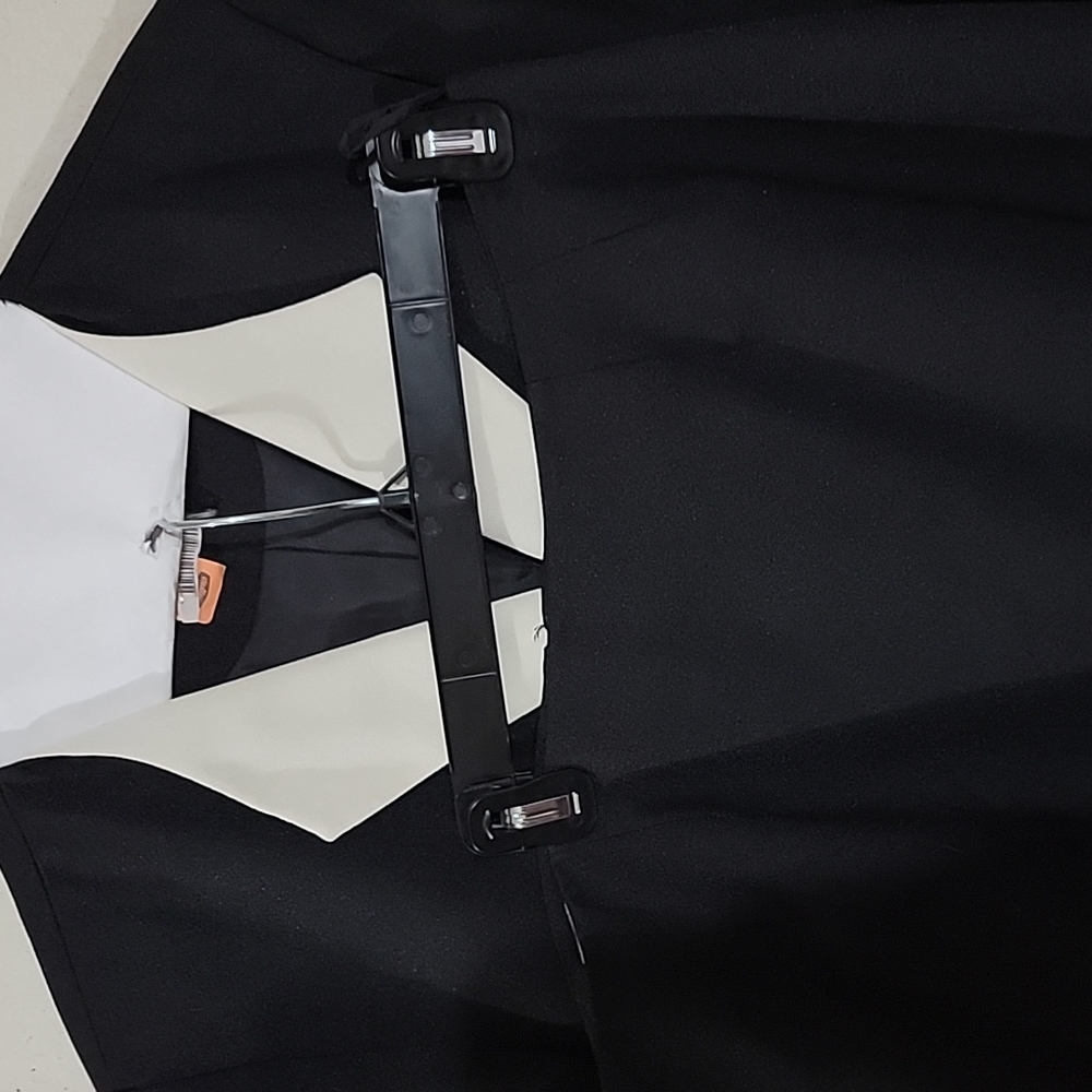 Black suit white collar